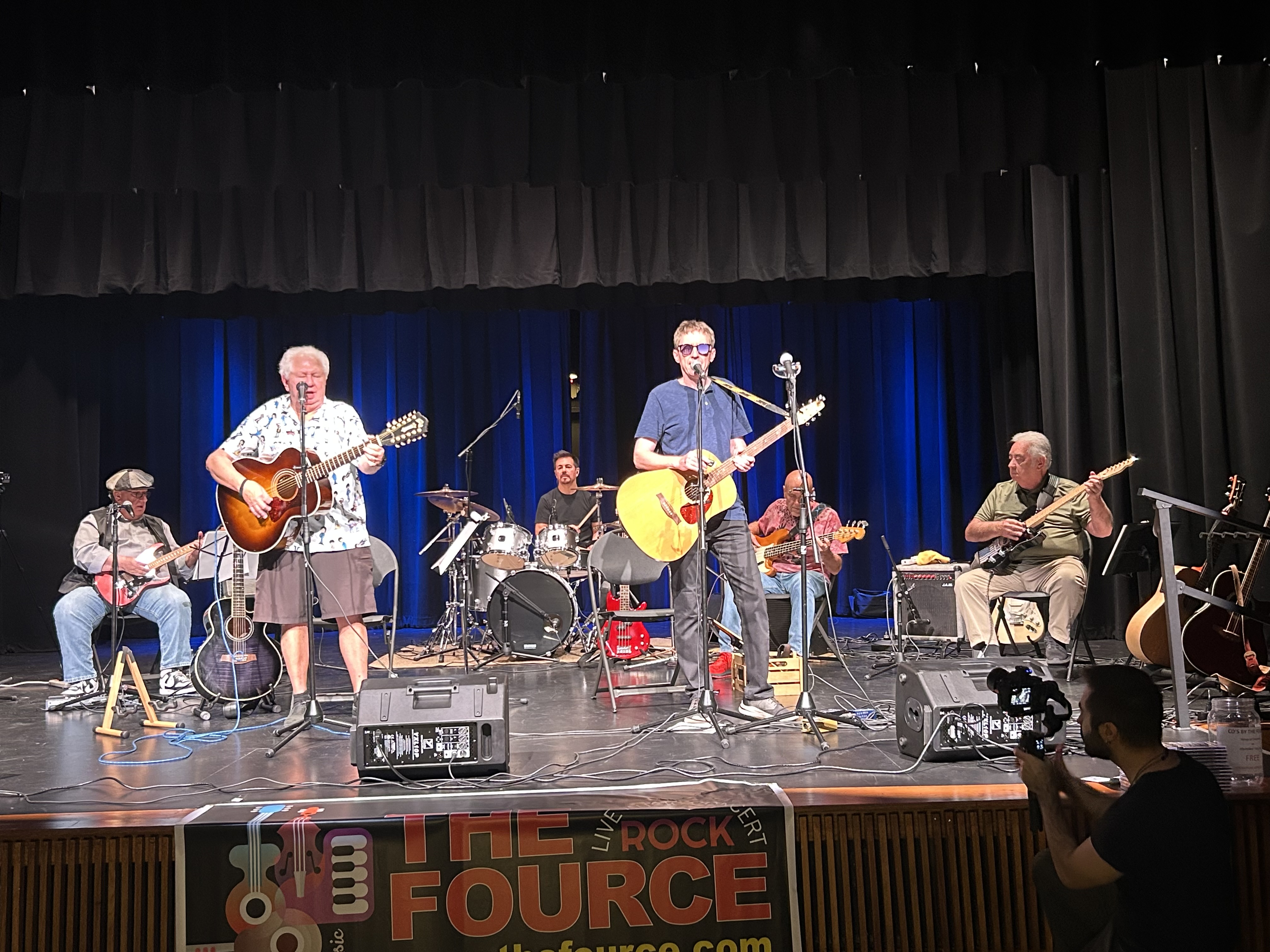 The Fource performing on stage